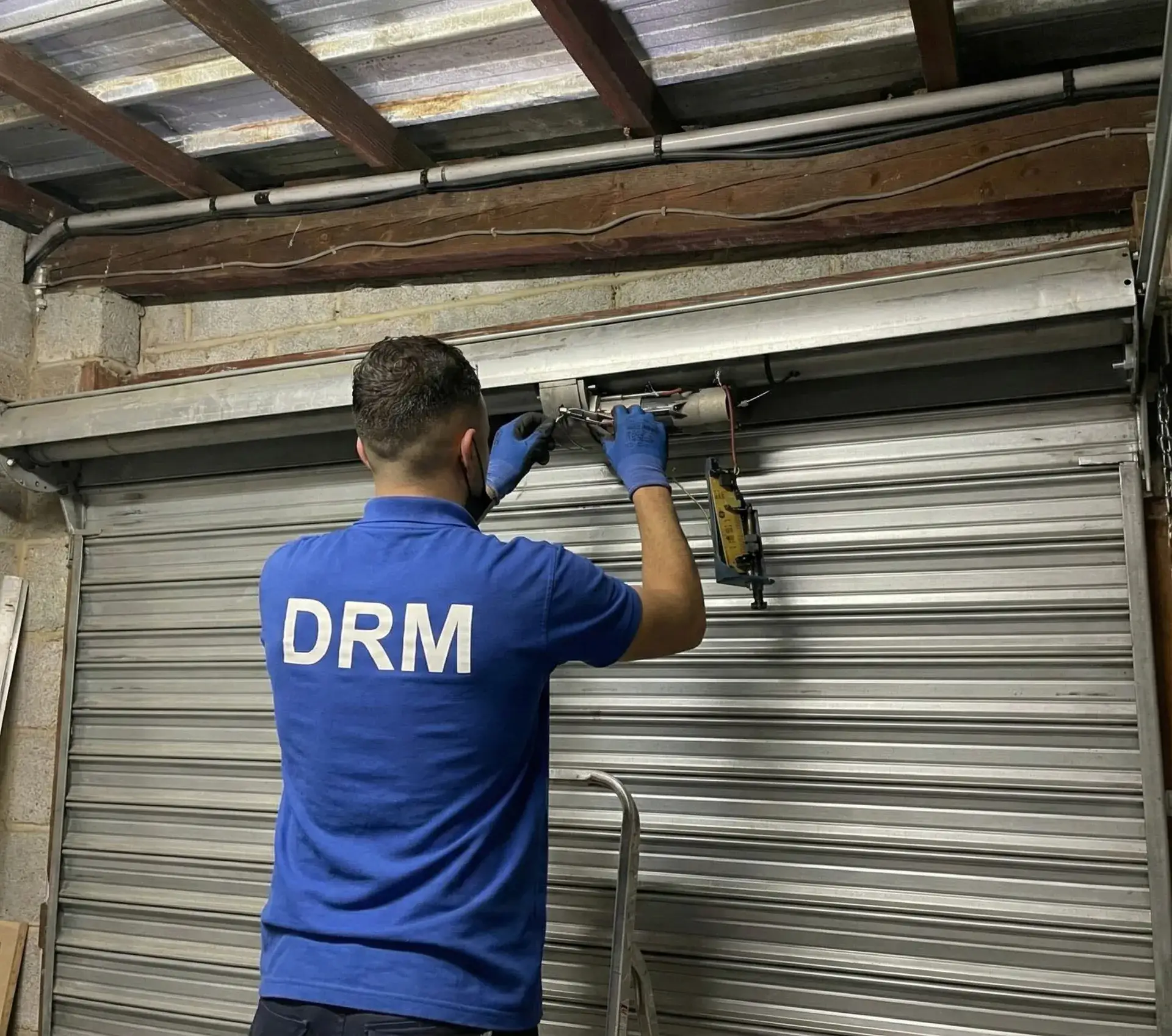 Motorisation de rideau metallique